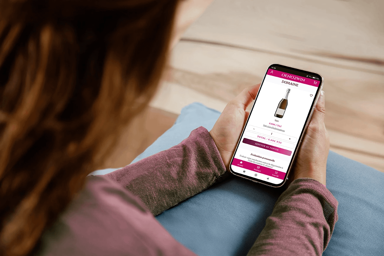 commande-vin-en-ligne Femme sur l’application Oeno2win, découverte de domaines viticoles et commande directe de vin